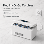 DoseDock travel cooler plugged into wall outlet showing AC power and battery dual-power modes, flexible for home and travel use, digital temperature display set to 4°C